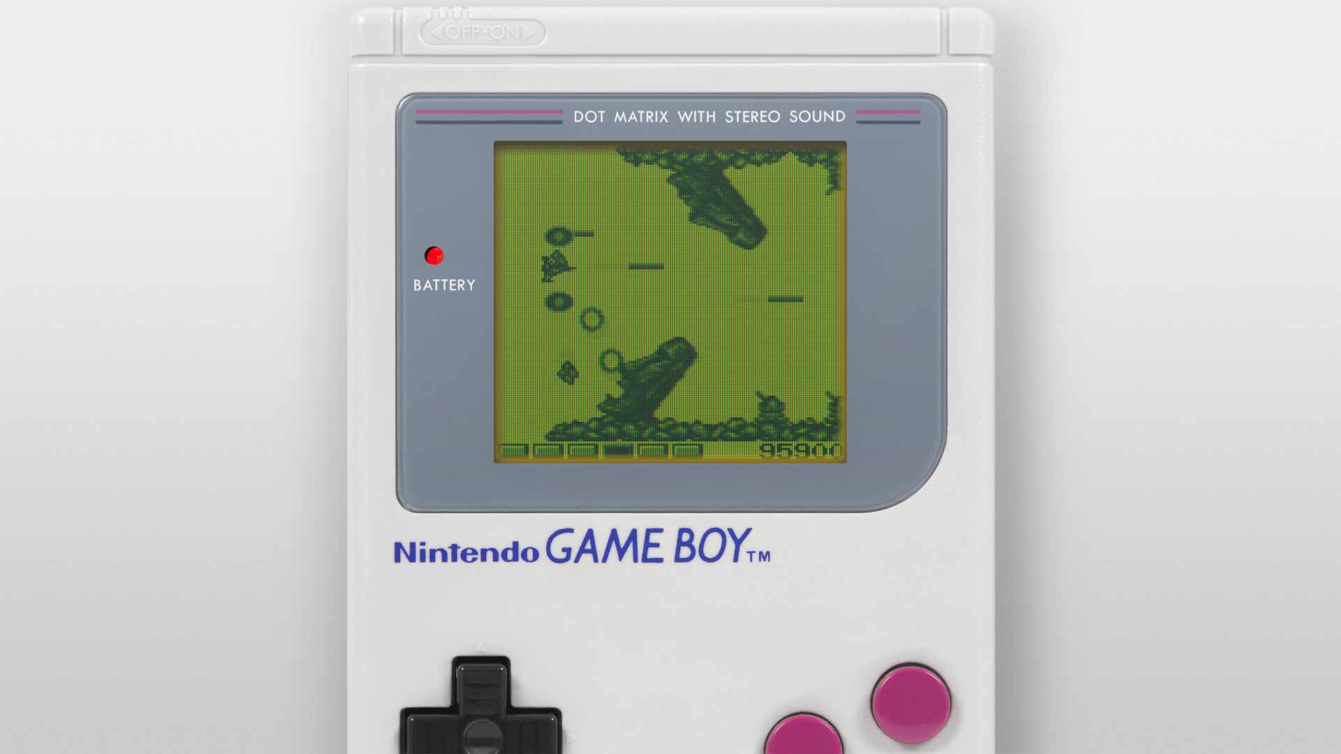 Actionreiche Szene aus Nemesis auf dem Game Boy – das Raumschiff wird von Geschossen angegriffen, während es sich durch enge Passagen kämpft.