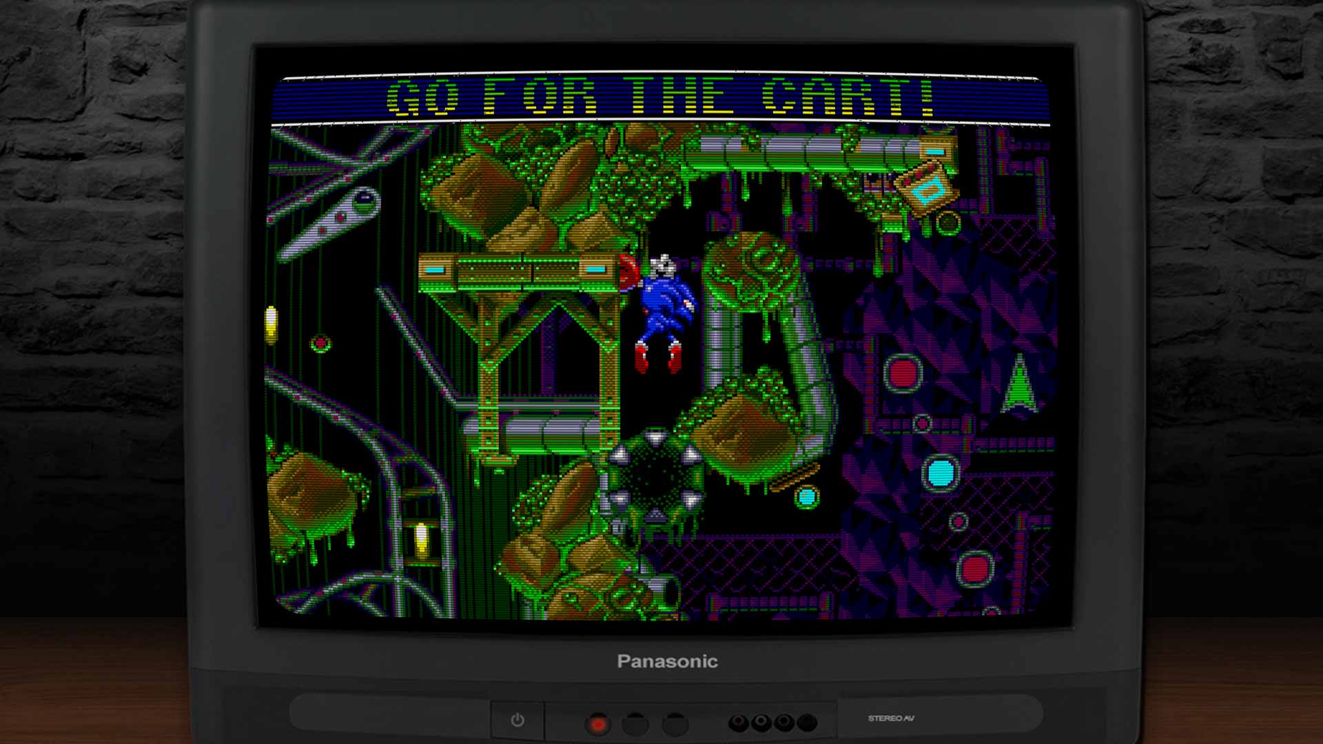 Sonic activiert einen Schalter – Umgebungsdesign voller Rohre und Schleim in Sonic Spinball.