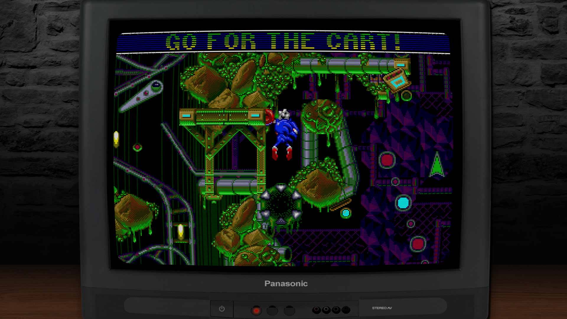 Sonic activiert einen Schalter – Umgebungsdesign voller Rohre und Schleim in Sonic Spinball.