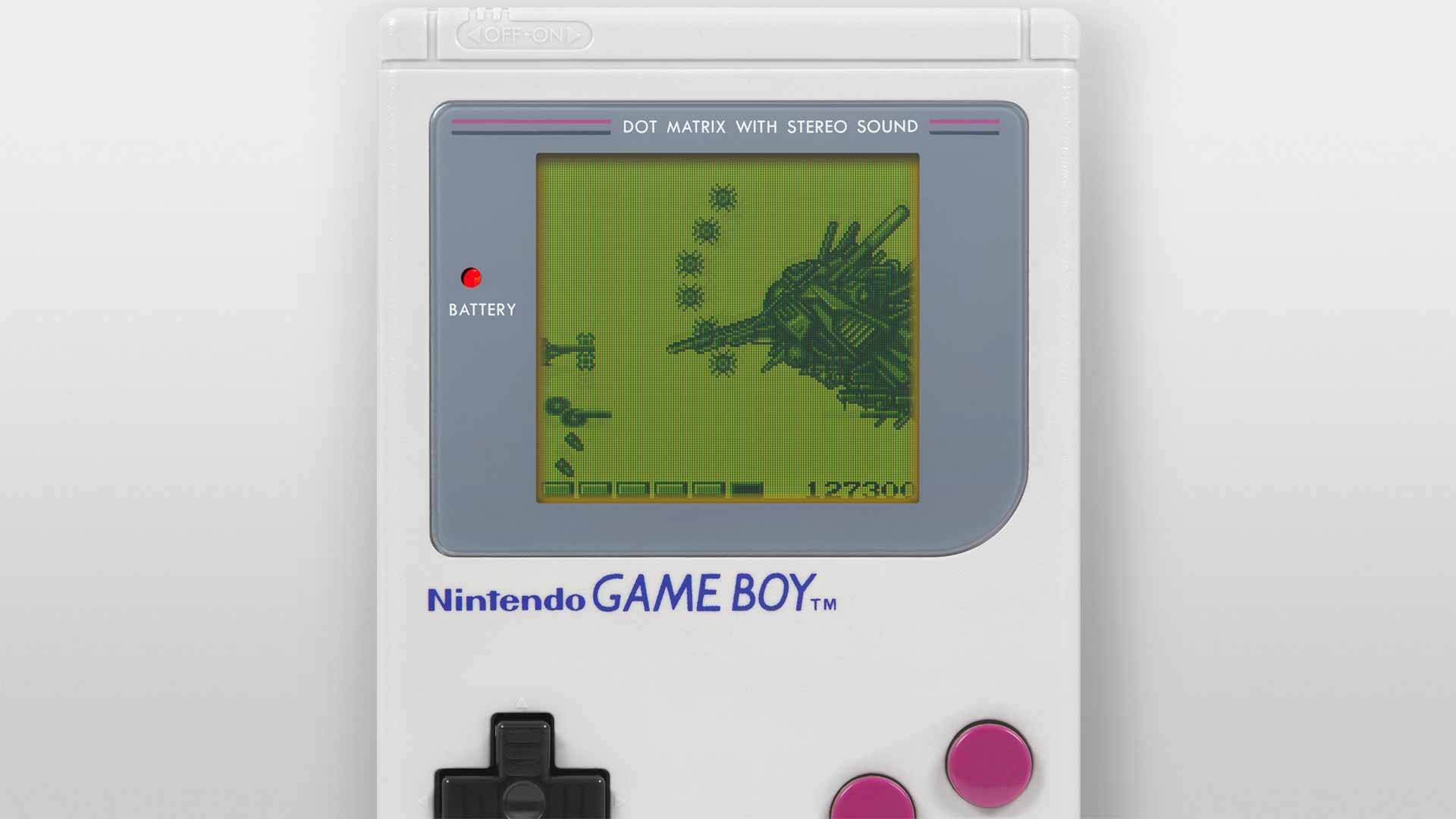 Bosskampf in Nemesis auf dem Game Boy – das Raumschiff steht einem gigantischen Gegner gegenüber, der kreisförmig Projektile abfeuert.